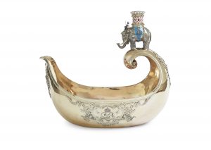 Ceremonial kovsh (drinking vessel) of gilt silver. The handle features the elephant of The Order of the Elephant. Made by Fabergé in St. Petersburg in 1892. Master: Julius Rappoport. The kovsh was a present to Christian IX and Queen Louise from their six children on the occasion of the royal couple’s golden wedding anniversary in 1892. Property of The Danish Royal Family’s Entailed Estate for Movables. Photo: Iben Kaufmann.